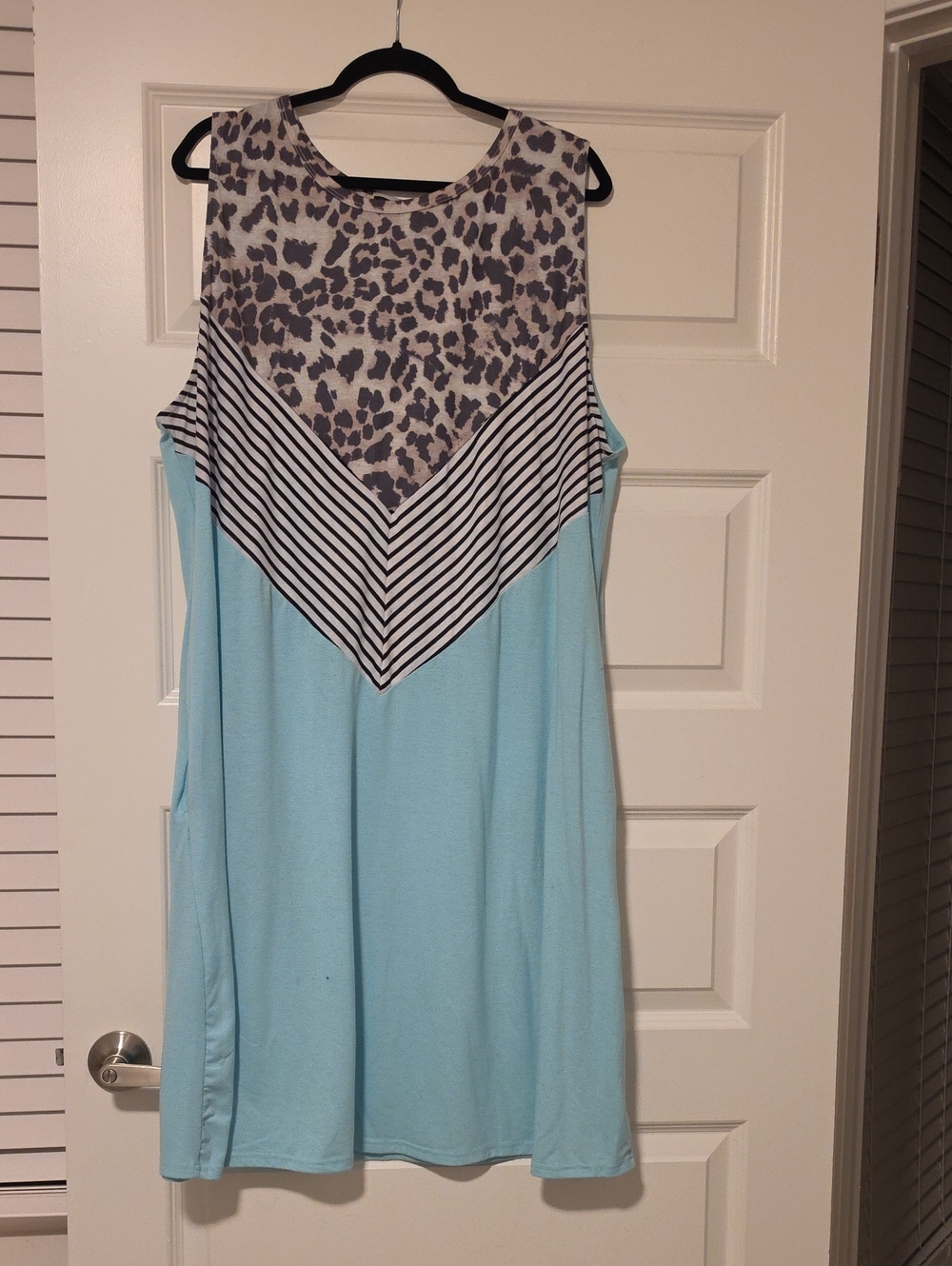 Sleeveless Light Blue Mixed-Print Shift Dress